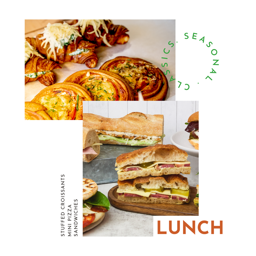 Hearty lunch spread with sandwiches, vibrant salads, and savory quiches, perfect for office meetings or personal events.