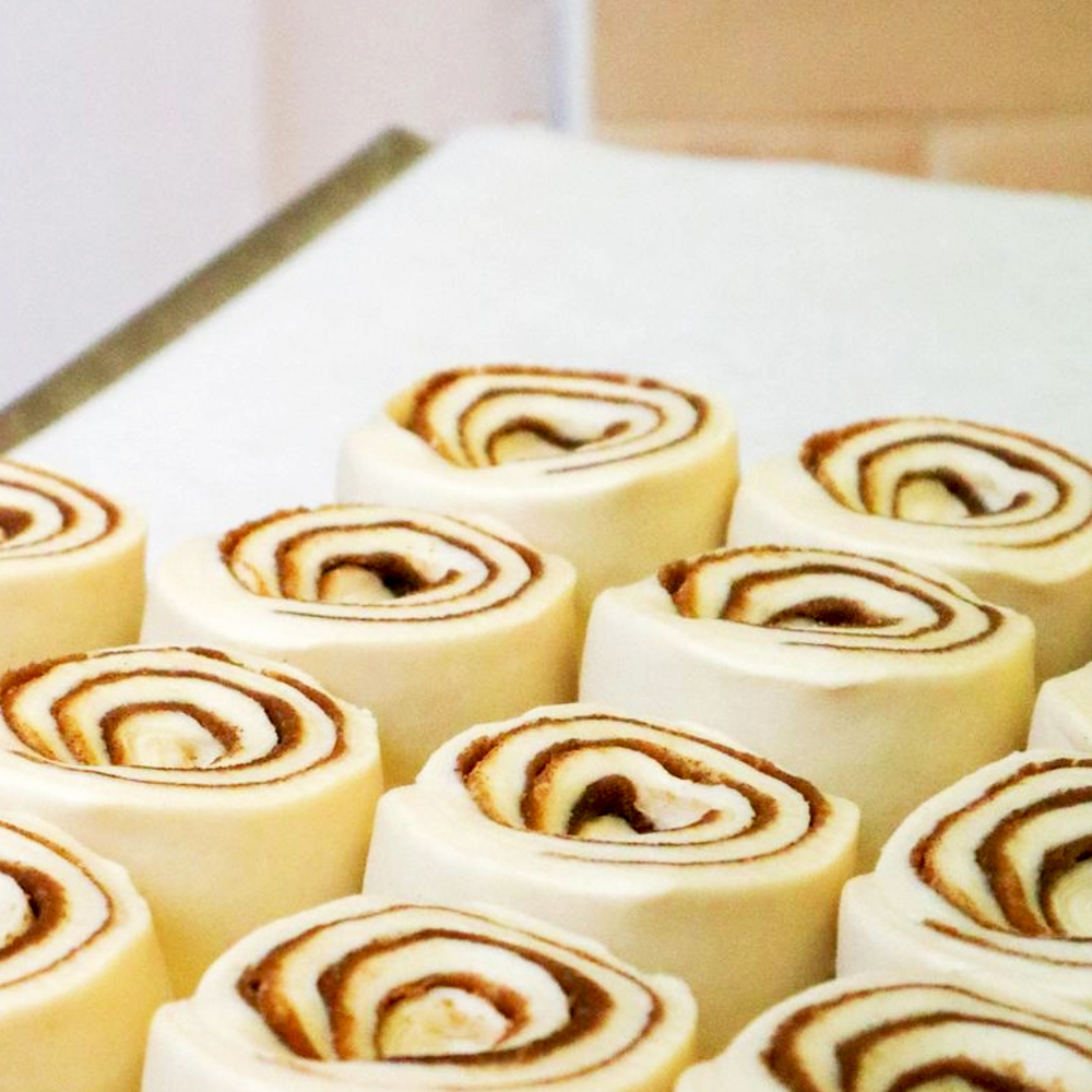 
                      
                        Handcrafted cinnamon bun pastries at Comptoir Bakery
                      
                    