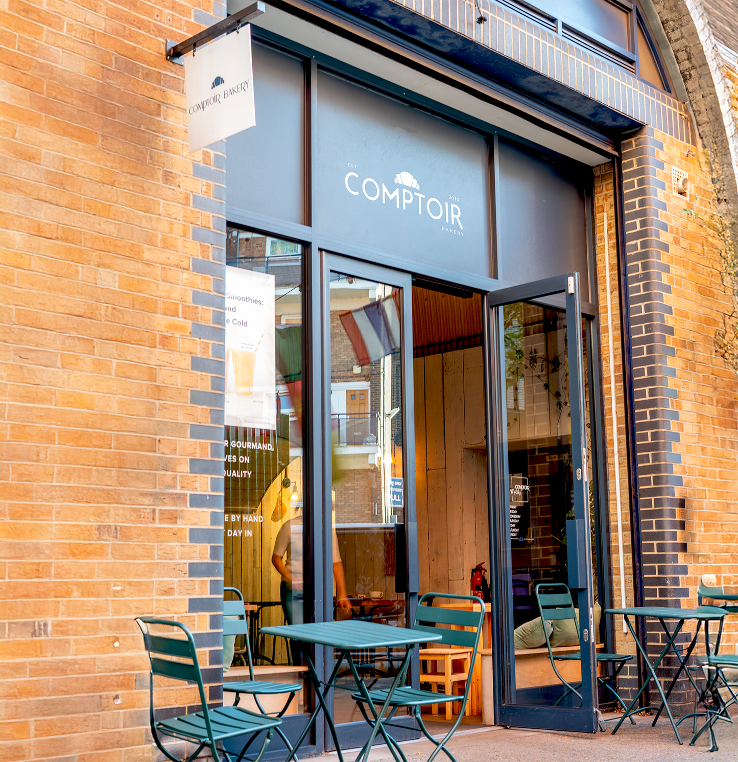 Front entrance to the Maltby Bakery and Coffee Shop with tables outside to sit and relax